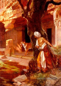 En attendant le peintre arabe tigre Rudolf Ernst Peinture à l'huile